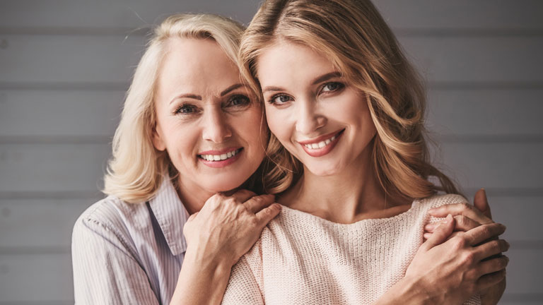 smiling-mother-and-daughter,-five-tips-to-cultivating-a-better-relationship-with-your-complicated-mother,-by-healthista.com